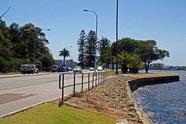 Photograph of road and edge of river