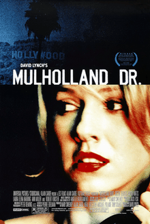 Theatrical release poster showing the film's title against a dark blue image of the Hollywood sign in Los Angeles atop another still shot of Laura Elena Harring in a blond wig staring at something off camera toward the lower right corner.