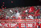 Nea Salamina Famagusta FC fans at Ammochostos Stadium in a game against Enosis Neon Paralimni FC in season 2006-07.