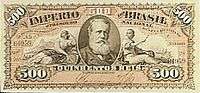 Photograph of a banknote containing a picture of a bearded man in the center and thee number 500 printed in the corners