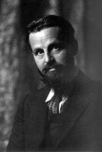 Portrait photograph of author Rex Stout at age 35, photographed by Arnold Genthe