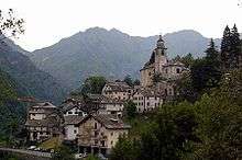 Mountain village, with houses and a church