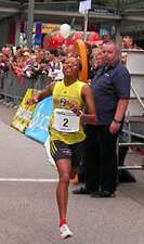 Ruth Wanjiru, right, in yellow vest as number 2