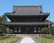 Two story pagoda in dark wood