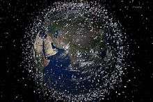 Earth from space, with space debris enhanced