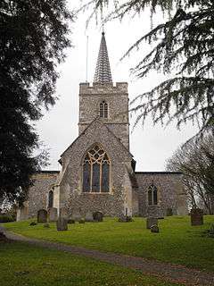 stone church with a slim metal spire