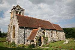 St Michael and All Angels seen from the north east with the tower