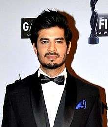 Tahir Raj Bhasin looking to the camera