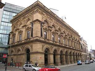 exterior of a Victorian building with ornate brickwork