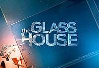 The title of the series, "The Glass House", on a pain glass.