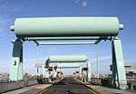 Three Bascule Bridges, Cardiff Bay Barrage.jpg