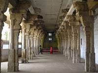 Corridor inside the temple showing a pillared hall