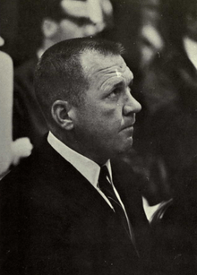 Bartlett in coat and tie, taken during game