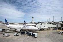 Two United 737's wait at the gates in Concourse C.