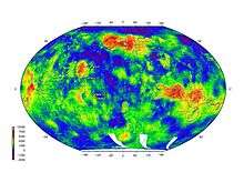 equal area projection of Venus's surface shown in false rainbow colour, with reds and yellows representing high altitudes and greens and blues representing low altitudes. Higher altitudes tend to cluster near the equator and the poles.