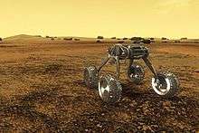 a spindly four-wheeled robot moves across Venus's dark surface, against its yellow sky