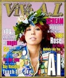 The album cover is produced in the format of a magazine cover. A mid-shot of Ai is featured against a pale pink background in the centre. She has a floral headdress, red hair and blue contacts, and is wearing a blue denim jacket with many button badges. Behind and above her head reads ViVa A.I. in a bordered font identitcal to US magazine Rolling Stone's font. To the left and right of Ai are the titles of the songs in blue, yellow and pink.