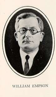 Formal portrait of William Empson, wearing eyeglasses and dressed in a coat and tie