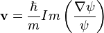 \mathbf{v}= \frac{\hbar}{m} Im \left(\frac{\nabla\psi}{\psi}\right) 