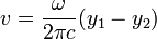 v = \frac{\omega}{2 \pi c} (y_1 - y_2)