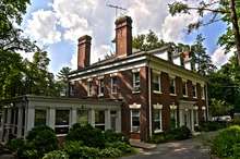 A rectangular two-story brick building