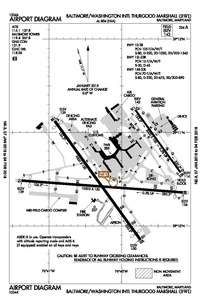 A map with a grid overlay showing the terminals runways and other structures of the airport.