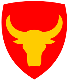 The head of the water buffalo symbolizes the Philippines. The colors red and gold represent the islands' Spanish colonial roots.