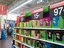 Discounted items, folders and notebooks priced at 15 cents.