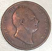 A worn copper coin dated 1831 with a portrait of a man (William IV) on it