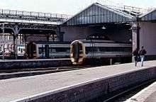 Rail station with two trains