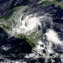 Satellite imagery of a small hurricane north of Honduras