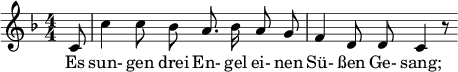  \relative c' { \clef treble \key f \major \numericTimeSignature \time 4/4 \autoBeamOff \partial 8*1 c8 | c'4 c8 bes a8. bes16 a8 g | f4 d8 d c4 r8 } \addlyrics { Es sun- gen drei En- gel ei- nen Sü- ßen Ge- sang; } 