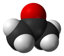 A ball structure of a molecule. Its backbone is a zig-zag chain of three carbon atoms connected in the center to an oxygen atom and on the end to 6 hydrogens.