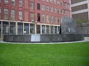 A photo of the memorial at the burial ground