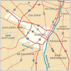 Map shows the city of Albany on the west bank of the Hudson, surrounded by the towns of Colonie, Guilderland, and Bethlehem. Roads are also shown. Interstates 90, 87, and 787 pass through the city boundaries.