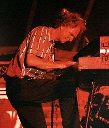 Pratt playing a keyboard