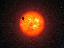 The newly discovered super-Earth orbiting the nearby star GJ 1214.