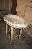 Baptism font inside the Église Saint-Ferréol les Augustins