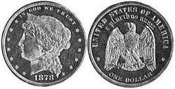 A silver dollar pattern depicting a left-facing woman on the obverse and an eagle on the reverse