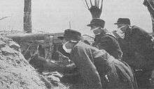 Soldiers wearing white surgical-type masks