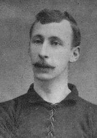 A man wearing a football shirt.