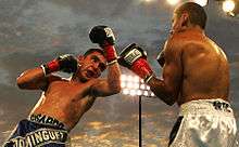 Ricardo Dominguez (left) is throwing an uppercut on Rafael Ortiz (right).