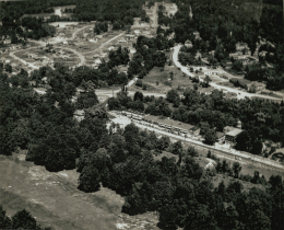 Aerial view of a small village downtown and houses