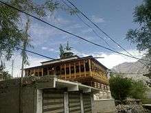 Chinese-style mosque with enclosed porch and speakers