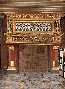 Large, ornate fireplace, now unused