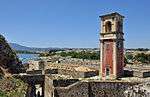 View over an old town near the sea with a castle.