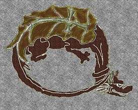 A dragon forming a circle with its tail on its neck