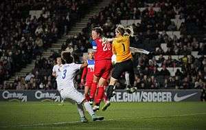 Abby Wambach, a retired player known for scoring header goals.