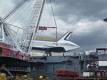 Weeks 533 lifts Enterprise onto Intrepid