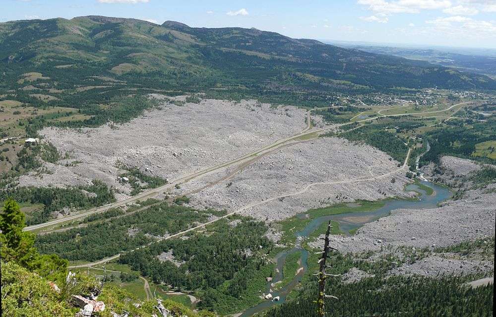 A field of rock debris that exists from the side of a mountain, down the valley below.